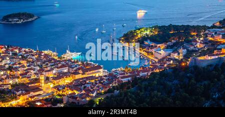 Aerial view of Hvar rooftops and harbor evening panoramic view, Dalmatia archipelago of Croatia Stock Photo