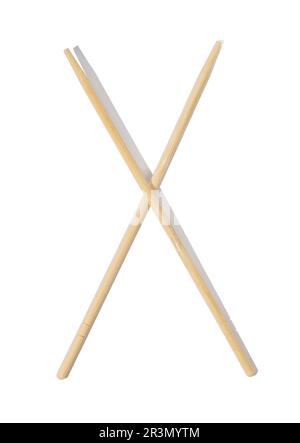 Two wooden chopsticks on a white isolated background, top view Stock Photo