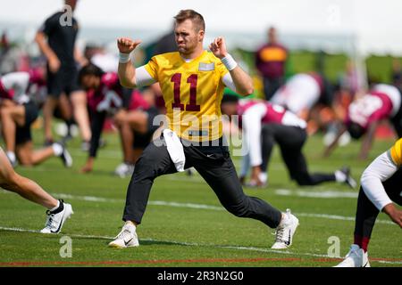 Landover, MD, USA - August 21, 2023 : Washington Commanders quarterback  Jake Fromm (11) throws the p