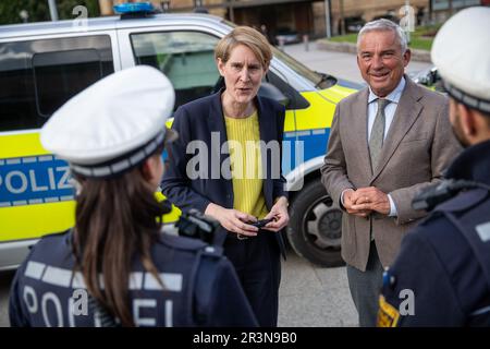 Stuttgart, Germany. 24th May, 2023. Baden-Württemberg's State Police President Stefanie Hinz (2nd from left) shows Baden-Württemberg's Interior Minister Thomas Strobl (3rd from left CDU), one of the new lamps for the equipment of the Southwest Police. Credit: Christoph Schmidt/dpa/Alamy Live News Stock Photo