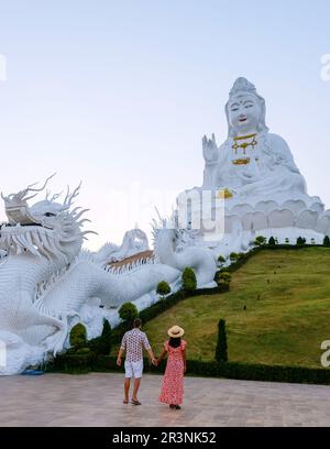 Couple visit Wat Huay Pla Kang Chiang Rai Thailand, Big Budha temple in Chiang Rai Stock Photo