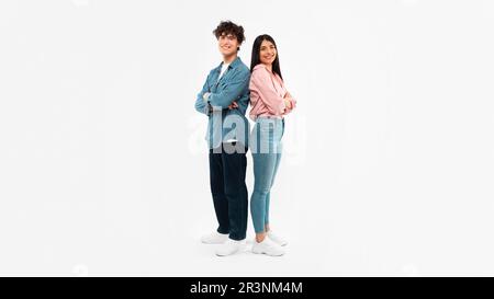 Happy Young Couple Posing Standing Over White Background Stock Photo