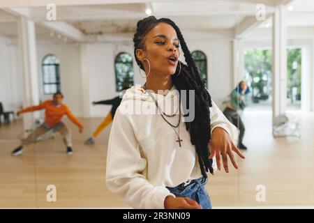 Image of african american female hip hop dancer practicing in studio Stock Photo
