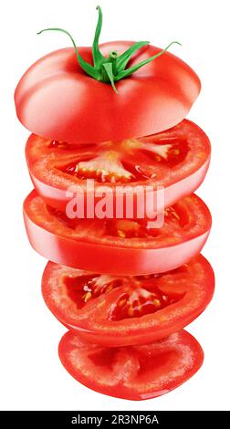 Sliced tomato flying in the air isolated on white background with clipping Path. Full depth of field. Stock Photo