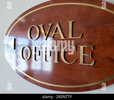 Oval wooden plaque with letters "Oaval Office on it Stock Photo