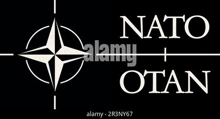 NATO North Atlantic Treaty Organization flag. NATO is international military alliance that constitut Stock Photo