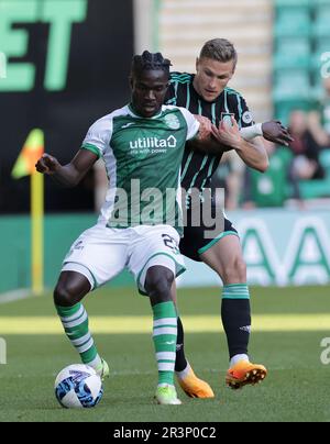 Hibernian's Elie Youan (left) and Celtic's Carl Starfelt battle for the ball during the cinch Premiership match at Easter Road, Edinburgh. Picture date: Wednesday May 24, 2023. Stock Photo