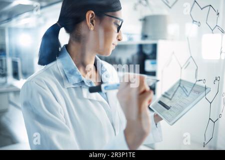 Tablet, research and female scientist in a laboratory planning a science equation on a board. Technology, medical innovation and woman researcher Stock Photo