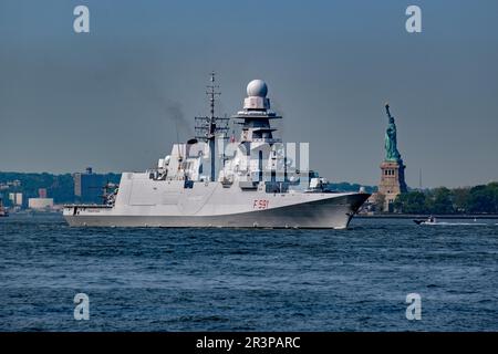 New York, New York, USA. 24th May, 2023. Fleet Week NYC 2023 Parade of Ships kicks off on the Hudson River as naval vessels from the US, UK, Canada and Italy along with thousands of sailors, coast guard and marines. The week long annual celebration of events and performances with men and women in white all over city streets is a welcome sight for New Yorkers. Italian Navy Guided Missile Frigate Virginio Fasan passes the Statue of Liberty in the Parade of Ships. (Credit Image: © Milo Hess/ZUMA Press Wire) EDITORIAL USAGE ONLY! Not for Commercial USAGE! Stock Photo