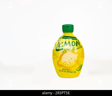 A plastic squeeze bottle with a flip-top lid of Concord Foods