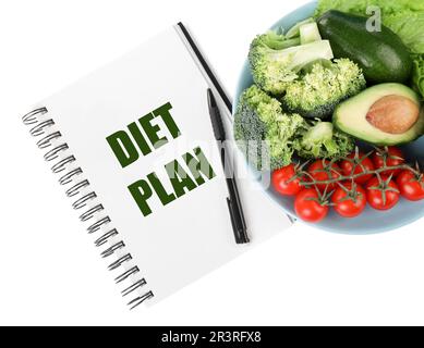 Notebook with phrase Diet Plan and different products on white background, top view Stock Photo