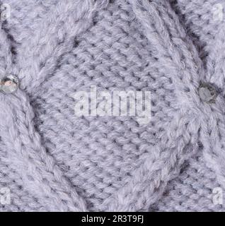 Texture of knitted gray fabric Stock Photo