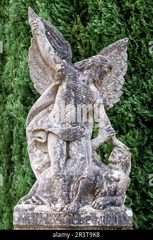 Saint Michael the archangel defeating the devil, cemetery, Santanyi, Mallorca, Balearic Islands, Spain. Stock Photo
