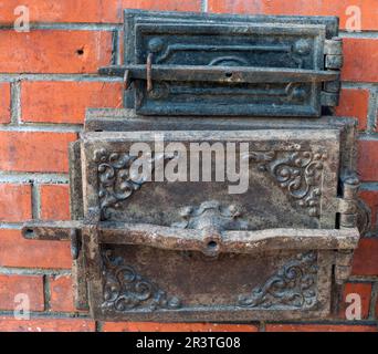 Two closed old furnace doors Stock Photo