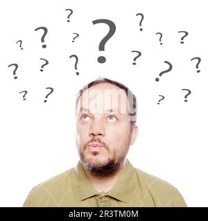 man in his forties looking up and thinking Stock Photo