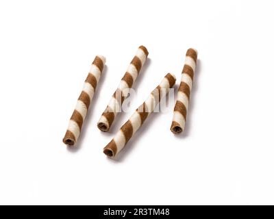 Wafer rolls with chocolate isolated on white background. Stock Photo