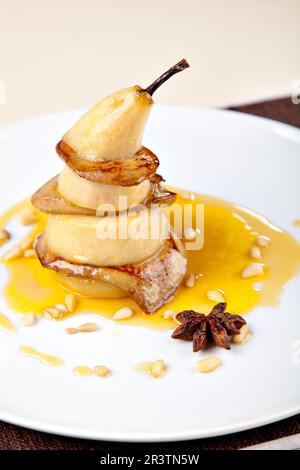 Fried foie gras with pear and sauce Stock Photo