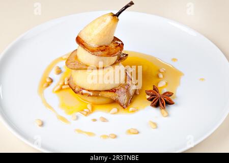 Fried foie gras with pear and sauce Stock Photo