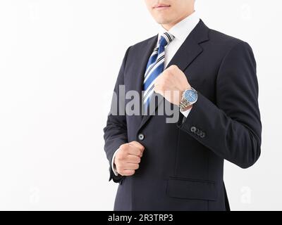 Japanese male businessmen fighting Stock Photo