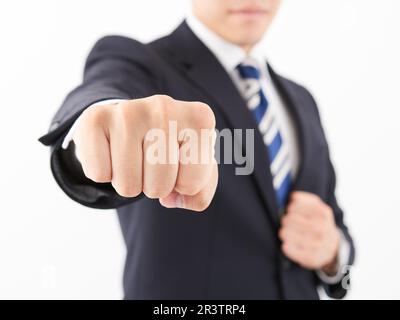 Japanese male businessman in overthrow pose Stock Photo