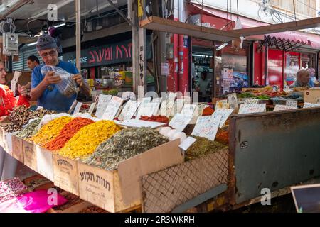 Tel Aviv, Israel - May 18, 2023 :Israeli people shopping at Carmel Market (Shuk HaCarmel) in Tel Aviv, Israel.It's a very popular marketplace in Tel A Stock Photo