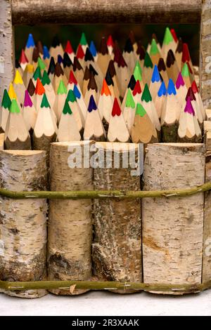 Wooden decorative pencils from birch sticks handmade at the fair Stock Photo