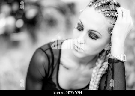 girl and Royal Enfield 500 motorbike, balearic islands. Stock Photo