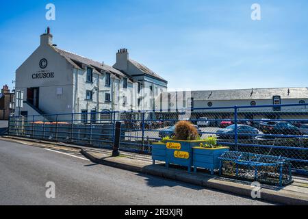 The Crusoe Hotel viewed from Drummochy Road Bridge in the Scottish coastal town of Lower Largo in Fife, Scotland, UK Stock Photo