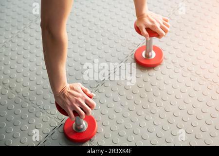 Dumbbell exercise weights standing on the floor in gym Stock Photo