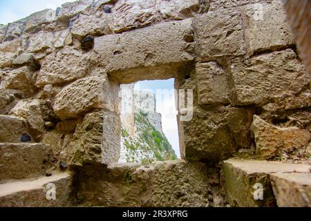 Krak (Crac) des Chevaliers, also called (Castle of the Kurds), and formerly Crac de l'Ospital, is a Crusader castle in Syria and one of the most impo Stock Photo