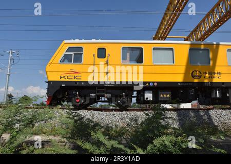 Bandung Regency, Tegalluar, West Java, Indonesia. May 25, 2023. A grinder train crosses the Jakarta-Bandung Fast Train Station in Tegalluar, Bandung Regency, Indonesia. Credit: Dimas Rachmatsyah/Alamy Live News Stock Photo