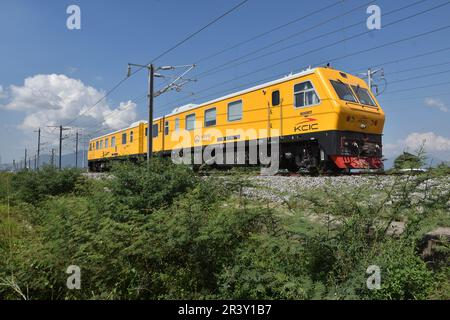 Bandung Regency, Tegalluar, West Java, Indonesia. May 25, 2023. A grinder train crosses the Jakarta-Bandung Fast Train Station in Tegalluar, Bandung Regency, Indonesia. Credit: Dimas Rachmatsyah/Alamy Live News Stock Photo