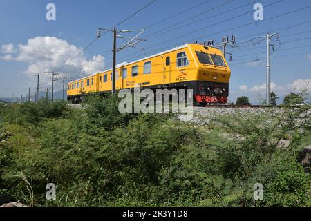 Bandung Regency, Tegalluar, West Java, Indonesia. May 25, 2023. A grinder train crosses the Jakarta-Bandung Fast Train Station in Tegalluar, Bandung Regency, Indonesia. Credit: Dimas Rachmatsyah/Alamy Live News Stock Photo