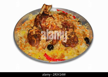 Mandi is a traditional dish from Yemen of meat, rice, and spices. It is now very popular in other areas of the Arabian Peninsula, and it is also commo Stock Photo