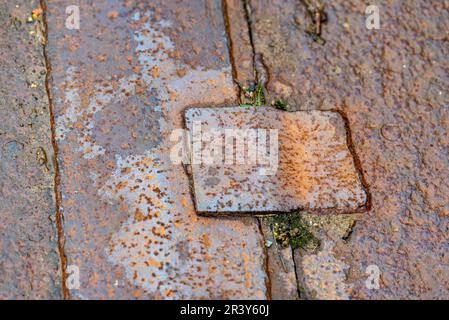Carriageway slab of steel in the outdoor area of a shipyard in Hamburg Stock Photo