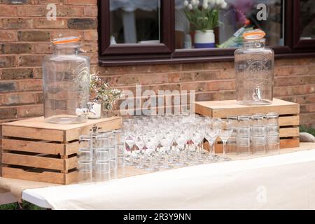 Glass jars of lemonade on party bar. Drinks on wedding party. Outside catering drinks service. Business, catering service. Drinks on summer party. Cat Stock Photo