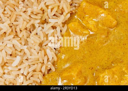 Chicken korma with brown rice close up Stock Photo