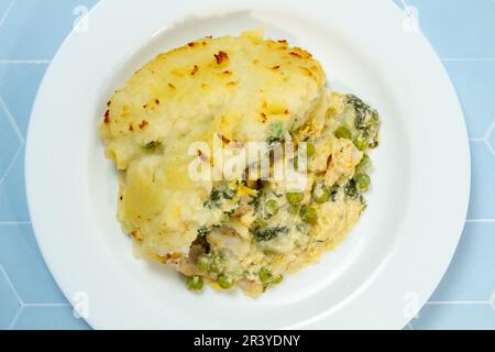 Easy fish pie with peas and spinach, from above Stock Photo