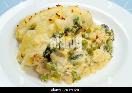 Easy fish pie with peas and spinach Stock Photo