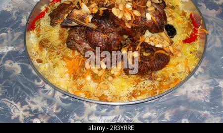 Mandi is a traditional dish from Yemen of meat, rice, and spices. It is now very popular in other areas of the Arabian Peninsula, and it is also commo Stock Photo