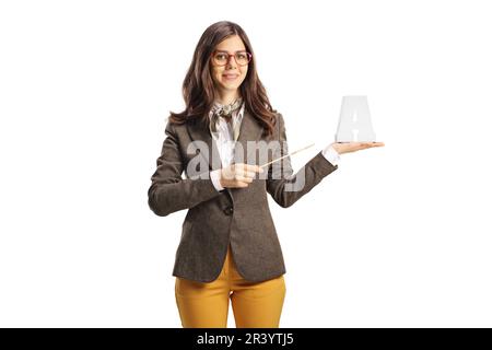 Young female with glasses holding the letter A and pointing with a stick isolated on white background Stock Photo