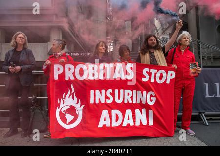 London, England, UK. 25th May, 2023. Members of Extinction Rebellion and Coal Action Network protest at Lloyds of London as they continue to insure fossil fuel companies and against Probitas for insuring Adani Credit: Denise Laura Baker/Alamy Live News Stock Photo