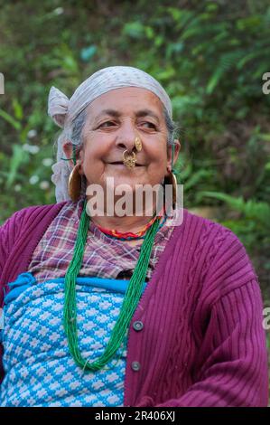 Sikkim, India - 23rd March 2004 : Senior citizen Sikkimese woman with thoughtful face. Sikkimese women are very hard working and they age very gracefu Stock Photo