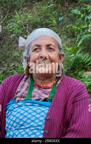 Sikkim, India - 23rd March 2004 : Senior citizen Sikkimese woman with smiling face. Sikkimese women are very hard working and they age very gracefully Stock Photo