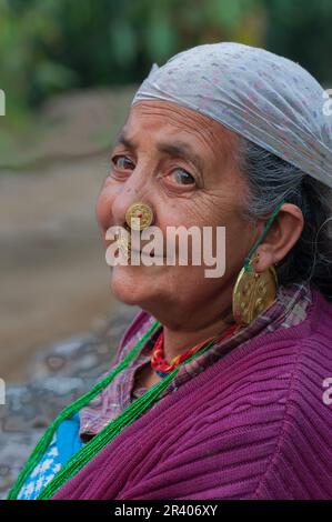 Sikkim, India - 23rd March 2004 : Senior citizen Sikkimese woman with thoughtful face. Sikkimese women are very hard working and they age very gracefu Stock Photo