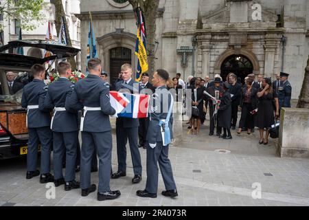 Pallbearers the coffin of Flt Sgt Peter Brown, a Jamaican-born WW2 RAF airman at the Royal Air Force's historic St Clement Danes Church, on 25th May 2023, in London, England. Hundreds of members of the armed forces, the Caribbean community, friends and neighbours attended the service because Flt Sgt Brown was one the last 'pilots of the Caribbean', a group of Afro-Caribbean volunteer RAF personnel but when he died at the age of 96 no family members were traced and so a campaign followed to recognise his wartime service and for a military send-off in London's central RAF church. Stock Photo