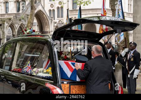 The coffin of Flt Sgt Peter Brown, a Jamaican-born WW2 RAF airman after his funeral service at the Royal Air Force's historic St Clement Danes Church, on 25th May 2023, in London, England. Hundreds of members of the armed forces, the Caribbean community, friends and neighbours attended the service because Flt Sgt Brown was one the last 'pilots of the Caribbean', a group of Afro-Caribbean volunteer RAF personnel but when he died at the age of 96 no family members were traced and so a campaign followed to recognise his wartime service and for a military send-off in London's central RAF church. Stock Photo