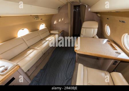 Cabin of an IL-18 military transport aircraft of the Russian Air Force. Stock Photo