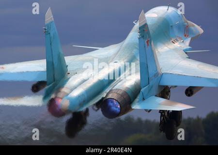 A Su-34 strike fighter of the Russian Air Force taking off. Stock Photo