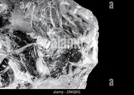 rough diamond, crystal in an allotropic form of carbon, uncut gemstone, concept of luxury or wealth Stock Photo